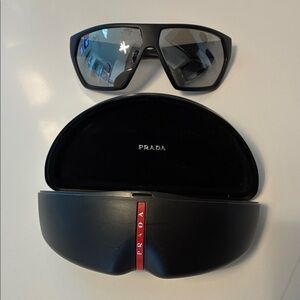 Prada Linea Rossa Black&Gray polarized Sunglasses with Red Accent.